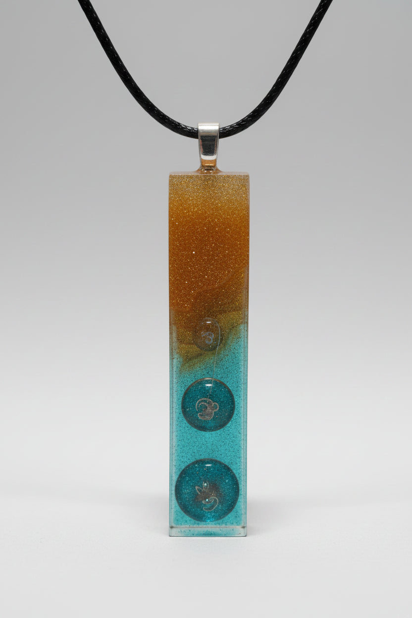 Aura Stones- pendulum with golden sand washing away into bubbly cool waters