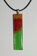 Aura stones- pendulum of red gold and green