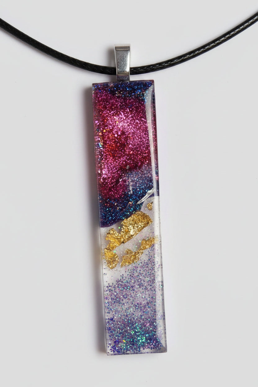 Aura Stones- pendulum with red Indigo gold and rainbows